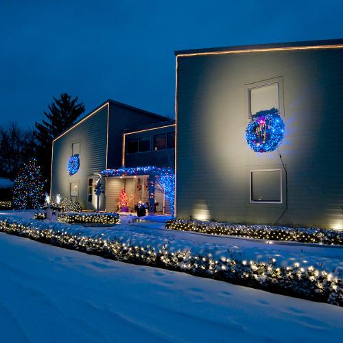 Building at night with Christmas lights and decorations